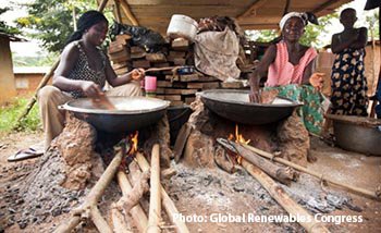 African women cooking with wood